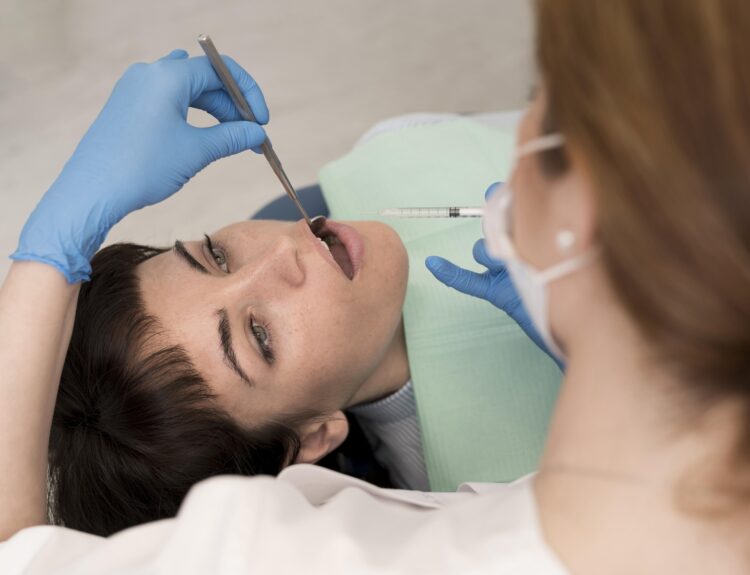 female-patient-having-procedure-done-dentist